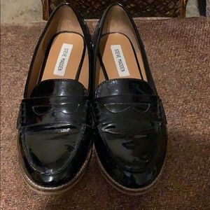 Black glossy penny loafers